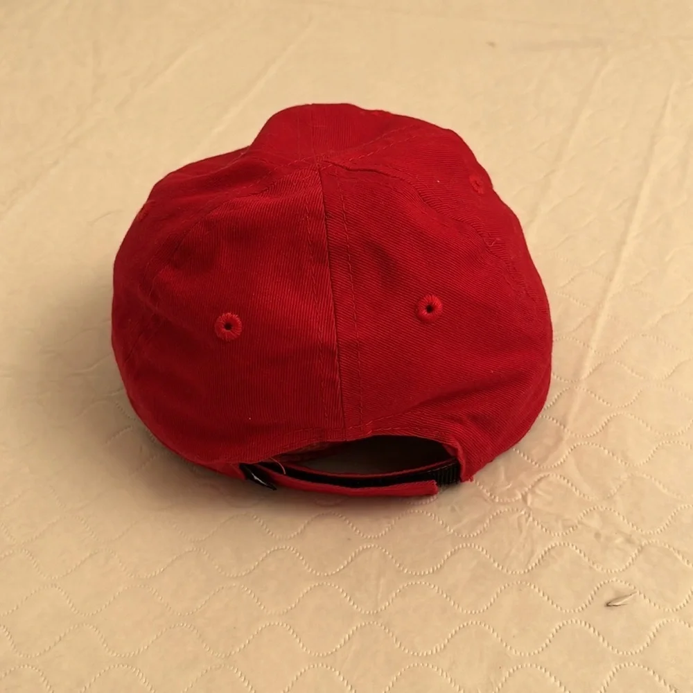 Nike red infant adjustable baseball hat with black swoosh